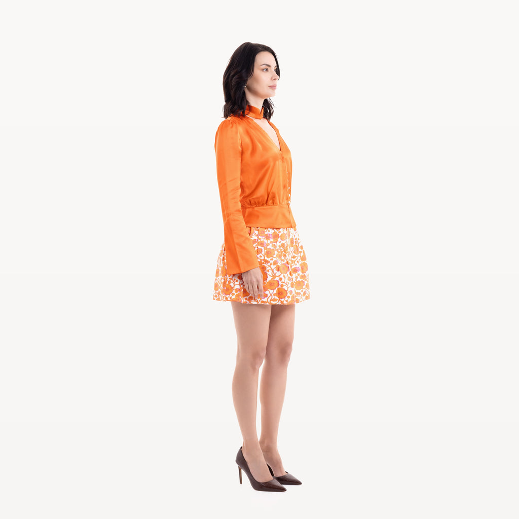Jupe Nara imprimé fleurs oranges - profil gauche look